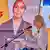 Cameroon's presidential candidate Tomaino Ndam Njoya, in front of her portrait poster, speaks via a microphone