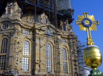 The new cross atop the rebuilt Frauenkirche is a British donation