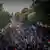 Miles de manifestantes propalestinos se reunieron en la estación Embankment para la Marcha Nacional por Palestina que se celebra cada mes. La manifestación recorrió el centro de Londres hasta llegar al número 10 de Downing Street. En la imagen, una multitud atraviesa una avenida de Londres ondeando banderas palestinas.