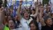 Many Israelis celebrate the release of the hostages, waving Israeli flags Many Israelis celebrate the release of the hostages, waving Israeli flags