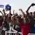 Supporters react during the FIFA World Cup 2026 Africa qualifiers group D match between Cape Verde and Eswatini at a fan zone in Sao Vicente