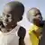 Still from the film 'Khartoum': Two children carrying bags.