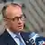 Belgien Brüssel 2025 | Friedrich Merz steht vor mehreren Mikrofonen