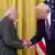 US President Donald Trump and Indian Prime Minister Narendra Modi shake hands at the White House on February 13, 2025