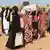 Displaced Sudanese who fled el-Fasher after the city fell to the Rapid Support Forces (RSF), arrive in the town of Tawila in war-torn Sudan's western Darfur region