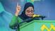 Samia Suluhu Hassan behind a podium, pointing upward during a speech Samia Suluhu Hassan behind a podium, pointing upward during a speech