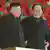 North Korea's new leader Kim Jong Un chats with Kim Yong Nam, president of the Presidium of the Supreme People's Assembly, the North's parliament, in Pyongyang in 2012