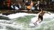 Surfers on the Eisbach wave in Munich Surfers on the Eisbach wave in Munich