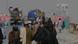 People and vehicles seen from behind as they cross into Afghanistan at the Chaman border crossing People and vehicles seen from behind as they cross into Afghanistan at the Chaman border crossing