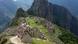 Aerial view of the Machu Picchu site with its ruins and terraced architecture Aerial view of the Machu Picchu site with its ruins and terraced architecture