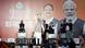 Narendra Modi on a stage with other poiiticians against a backdrop with his picture Narendra Modi on a stage with other poiiticians against a backdrop with his picture