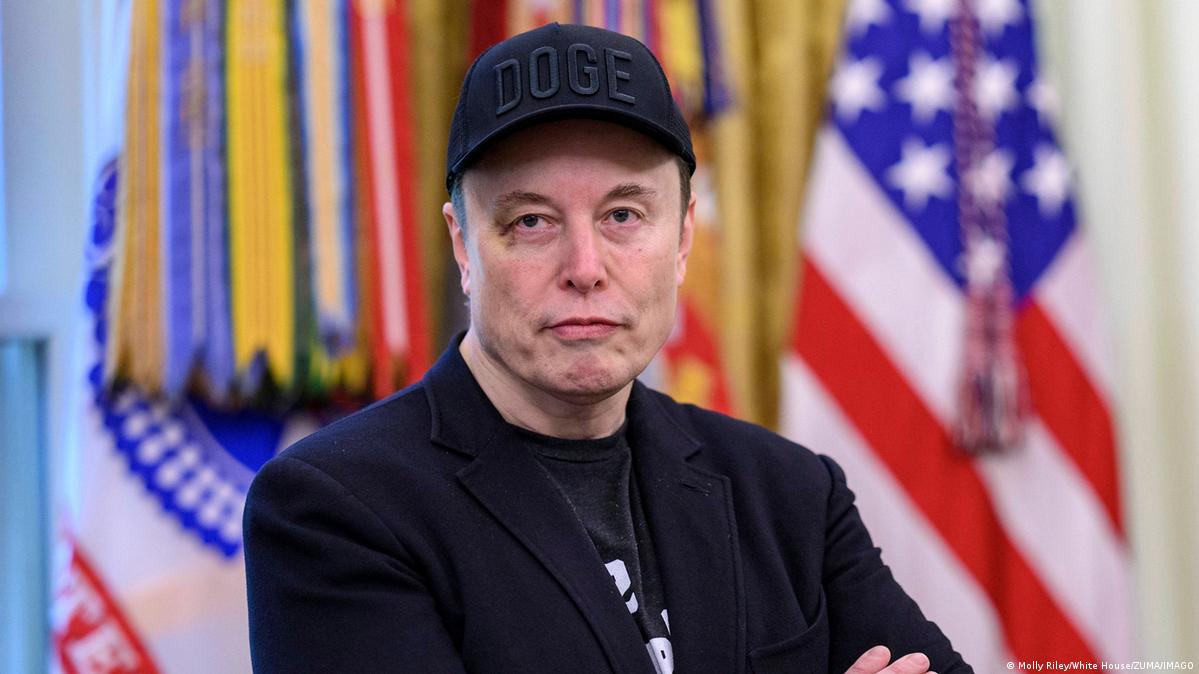 Elon Musk in the Oval Office weaing a DOGE cap on May 30, 2025