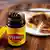 A piece of toast is prepared with Vegemite in Sydney, Australia, Monday, Nov. 17, 2025.