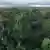 An areial drone photo take of the rainforest in Manaus will lots of green trees