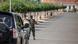 A soldier stops a car near the scene of gunfire near the presidential palace in Bissau. A soldier stops a car near the scene of gunfire near the presidential palace in Bissau.