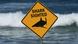 A sign is seen at the site of a fatal shark attack in Sydney, Australia A sign is seen at the site of a fatal shark attack in Sydney, Australia