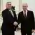 Russia's President Vladimir Putin and Hungary's Prime Minister Viktor Orban shake hands during a meeting at the Kremlin in Moscow on November 28
