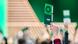 A Green party member holds up a green voting card with the sunflower emblem on it during a vote at the national party conference in Hanover in November 2025 A Green party member holds up a green voting card with the sunflower emblem on it during a vote at the national party conference in Hanover in November 2025