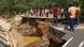 People gather around Sri Lanka's Deduru Oya Bridge, which collapsed after floods in Kurunegala on November 30, 2025 People gather around Sri Lanka's Deduru Oya Bridge, which collapsed after floods in Kurunegala on November 30, 2025