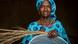 Nogaye Ndir with a handmade basket in the village of Mborine Nogaye Ndir with a handmade basket in the village of Mborine