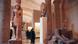 Visitors walk through the Egyptian galleries at the Louvre Museum in Paris