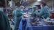 Doctors and nurses in an operation theater working on a heart transplant Doctors and nurses in an operation theater working on a heart transplant