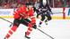 Connor McDavid of Canada carries the puck as USA forward Auston Matthews looks on Connor McDavid of Canada carries the puck as USA forward Auston Matthews looks on