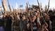 Houthi supporters in Yemen brandish weapons during a demonstration marking Independence Day Houthi supporters in Yemen brandish weapons during a demonstration marking Independence Day