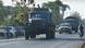Soldiers in military trucks Soldiers in military trucks