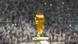 Close-up of the World Cup trophy on display in the Lusail Iconic Stadium on December 21, 2022, prior to the 2022 World Cup final between France and Argentina. A packed crowd is visible in the background. Close-up of the World Cup trophy on display in the Lusail Iconic Stadium on December 21, 2022, prior to the 2022 World Cup final between France and Argentina. A packed crowd is visible in the background.