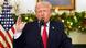 President Donald Trump raises his hand as he speaks during an address to the nation from the White House on December 17, 2025, in Washington. Behind him are Christmas decorations and the US flag. President Donald Trump raises his hand as he speaks during an address to the nation from the White House on December 17, 2025, in Washington. Behind him are Christmas decorations and the US flag.