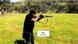 A man dressed in black aims a rifle on a grassy clearing surrounded by trees in a video released by Australian authorities on Dec 22, 2025 A man dressed in black aims a rifle on a grassy clearing surrounded by trees in a video released by Australian authorities on Dec 22, 2025