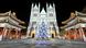 A Christmas tree, lit in blue, stands in front of the Xishiku Church 