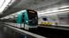 This photograph shows a subway train entering a metro station in Paris This photograph shows a subway train entering a metro station in Paris