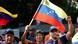 Manifestantes protestas por la captura de Maduro en Caracas.