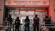 U.S. Department of Justice Federal Officers stand guard outside the Department of Justice next to the Metropolitan Detention Center in Brooklyn (MDC Brooklyn) U.S. Department of Justice Federal Officers stand guard outside the Department of Justice next to the Metropolitan Detention Center in Brooklyn (MDC Brooklyn)