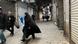 People walk as shops are closed during protests in Tehran's centuries-old main bazaar People walk as shops are closed during protests in Tehran's centuries-old main bazaar