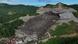 An aerial view of a huge mound of garbage that collapsed at a waste segregation facility in Binaliw An aerial view of a huge mound of garbage that collapsed at a waste segregation facility in Binaliw