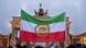 Protesters holding up an Iranian flag in front of the Brandenburg Gate in Berlin Protesters holding up an Iranian flag in front of the Brandenburg Gate in Berlin