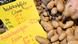 Potatoes with handwritten list of prices and names. Potatoes with handwritten list of prices and names.