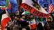 Des manifestants avec des drapeaux de l'Iran Des manifestants avec des drapeaux de l'Iran