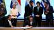 Ursula von der Leyen looks on as Paraguay's Foreign Minister Ruben Ramirez Lezcano signs Mercosur documents, with Latin American heads of state in the background Ursula von der Leyen looks on as Paraguay's Foreign Minister Ruben Ramirez Lezcano signs Mercosur documents, with Latin American heads of state in the background