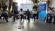 Workshop participants sitting on chairs discuss with each other