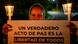 Venezolana con velas y un cartel que apunta a la libertad de todos los presos políticos en ese país. Venezolana con velas y un cartel que apunta a la libertad de todos los presos políticos en ese país.