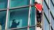 Climber Alex Honnold interacts with onlookers free soloing Taipei 101 skyscraper in Taipei, Taiwan Climber Alex Honnold interacts with onlookers free soloing Taipei 101 skyscraper in Taipei, Taiwan