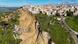 A drone picture shows houses perched along the edge of a cliff after a landslide in Niscemi A drone picture shows houses perched along the edge of a cliff after a landslide in Niscemi