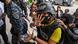 Frenchie Mae Cumpio, a detained Filipino journalist, gestures as she arrives at Tacloban Regional Trial Court in Leyte island on January 22, 2026 Frenchie Mae Cumpio, a detained Filipino journalist, gestures as she arrives at Tacloban Regional Trial Court in Leyte island on January 22, 2026