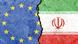 Symbolbild | Flaggen der EU und des Iran auf einer rissigen Betonwand Symbolbild | Flaggen der EU und des Iran auf einer rissigen Betonwand