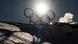 The Olympic rings seen backlit on a snowy Italian mountainside The Olympic rings seen backlit on a snowy Italian mountainside
