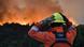 A civil protection member looks at an area affected by wildfires in Cholila, in the patagonian province of Chubut, Argentina, February 1, 2026. A civil protection member looks at an area affected by wildfires in Cholila, in the patagonian province of Chubut, Argentina, February 1, 2026.